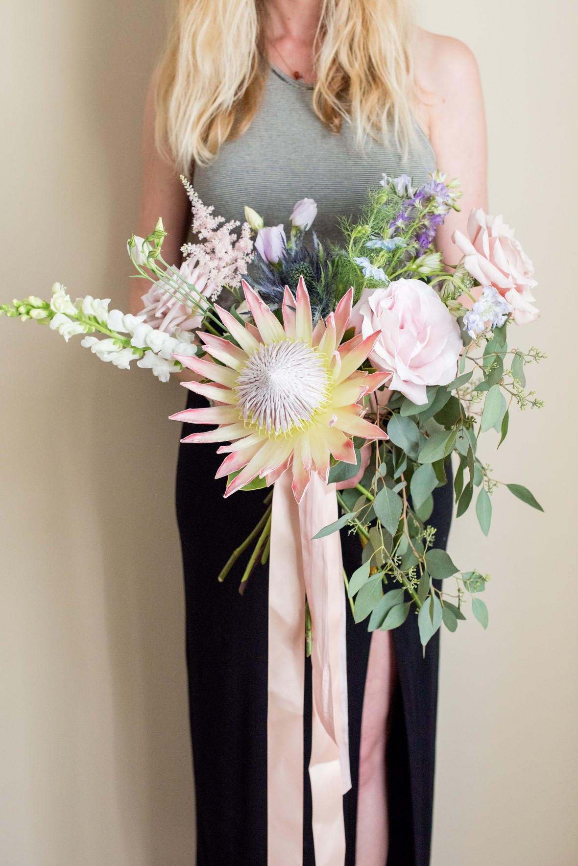 Peony and garden rose bouquet, whimsical designs with horizontally focused greenery with short ribbons