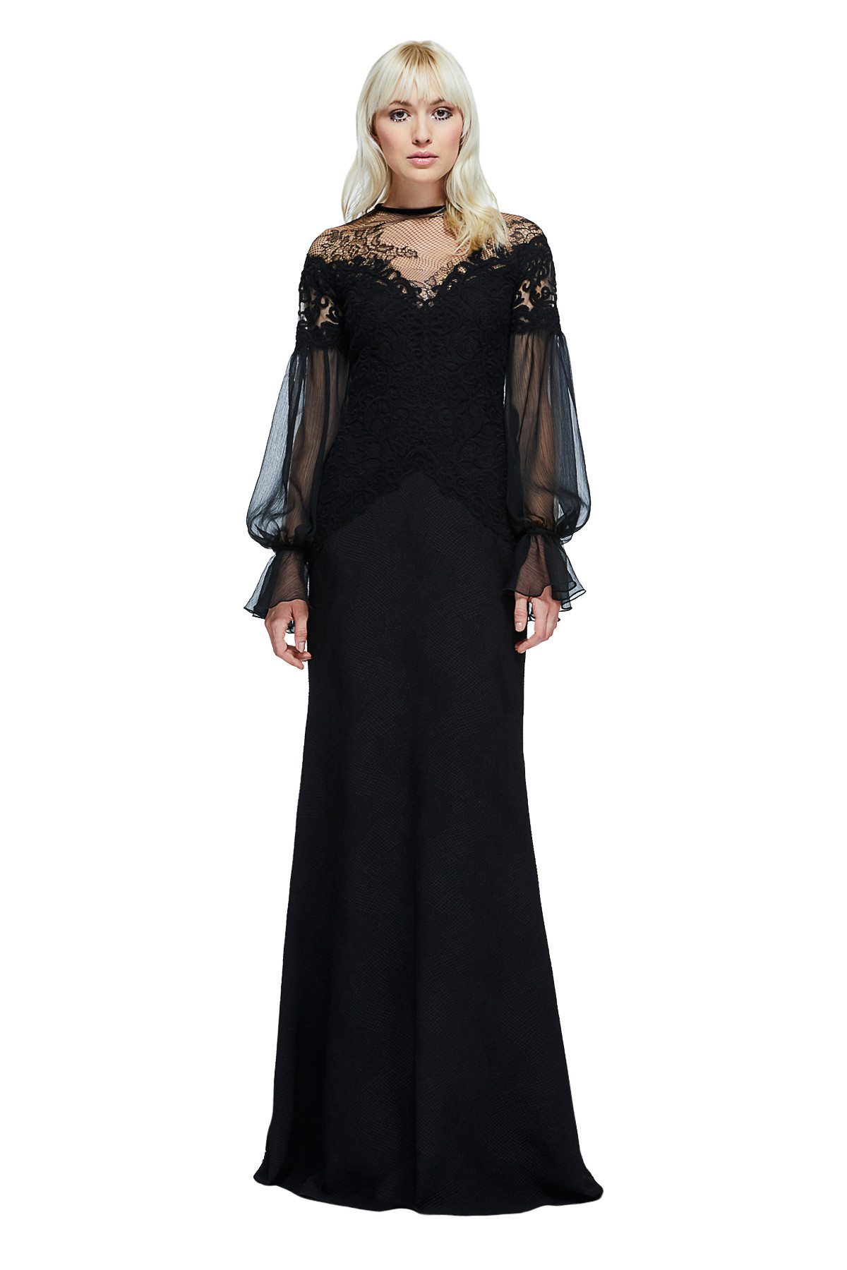 Platinum blonde model posing in dramatic lace neckline with full sheer sleeves Tadashi Shoji gown