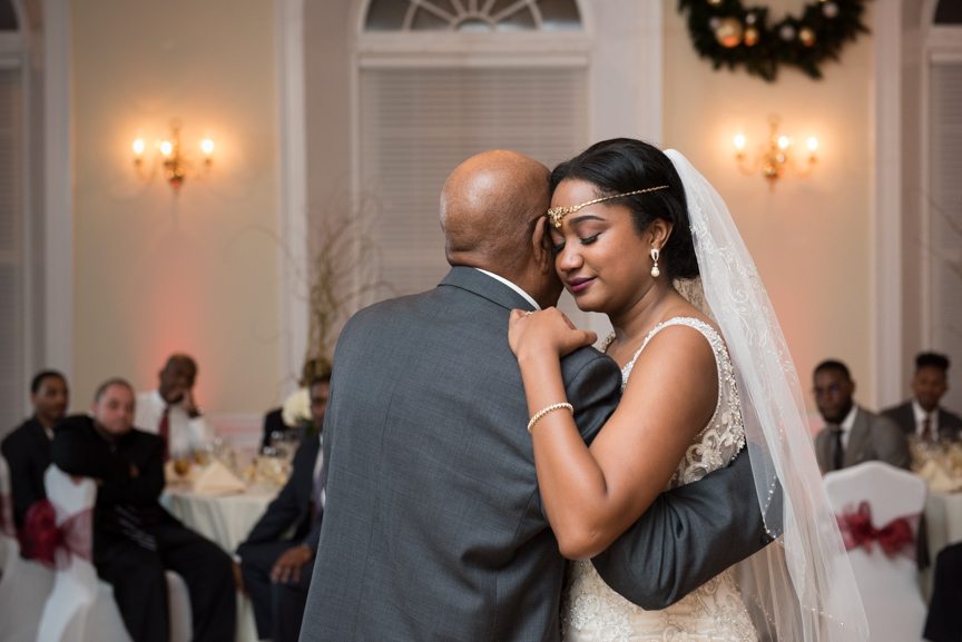 bride slow dancing with father