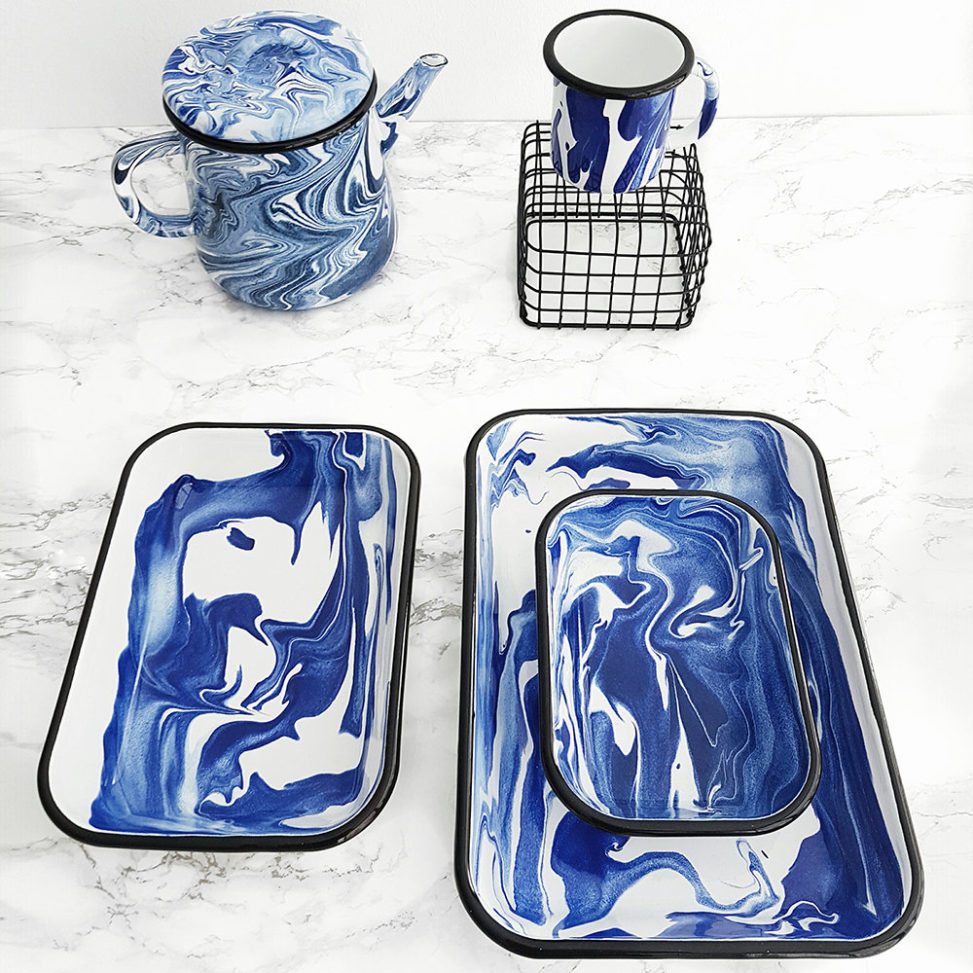 Marbled blue baking dishes on marble countertop